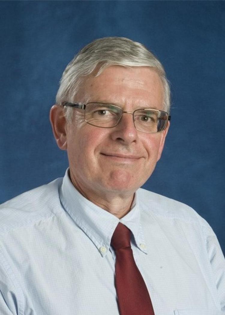 Portrait of Associate Professor Michael Woodward